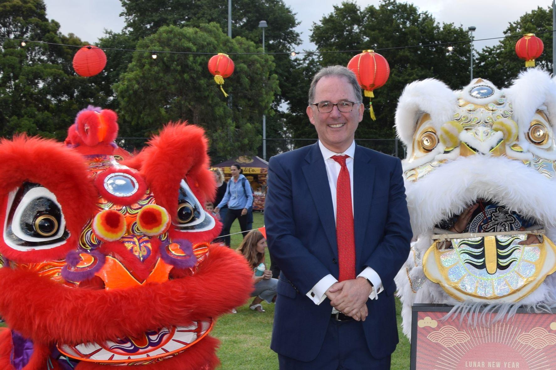 Alister Henskens SC MP at with Lunar New Year lanterns and dragons